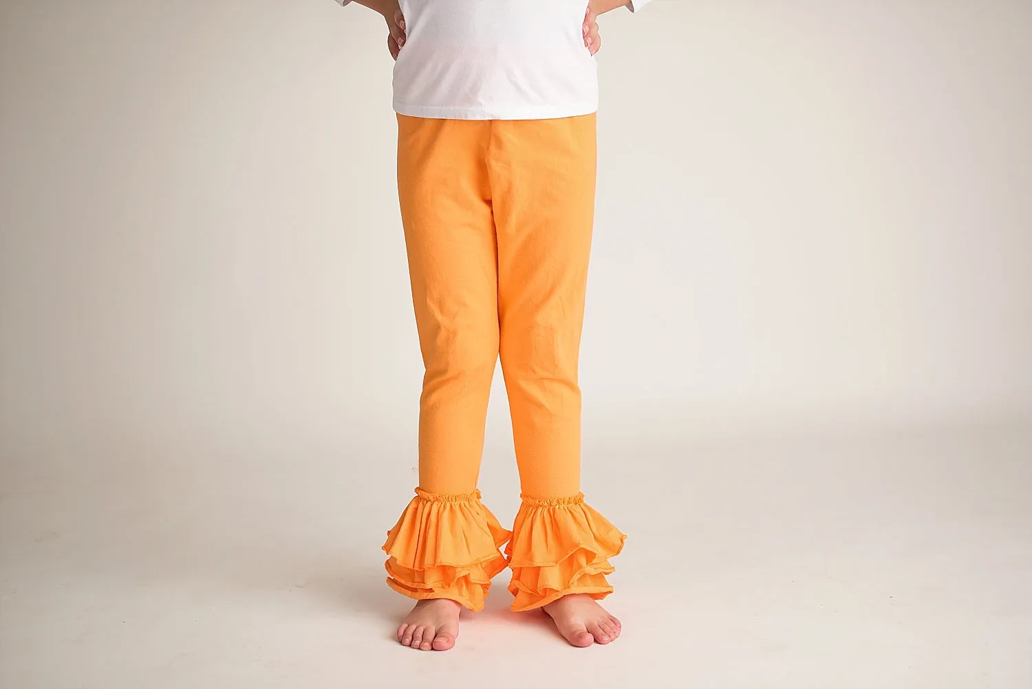 ORANGE RUFFLE PANTS